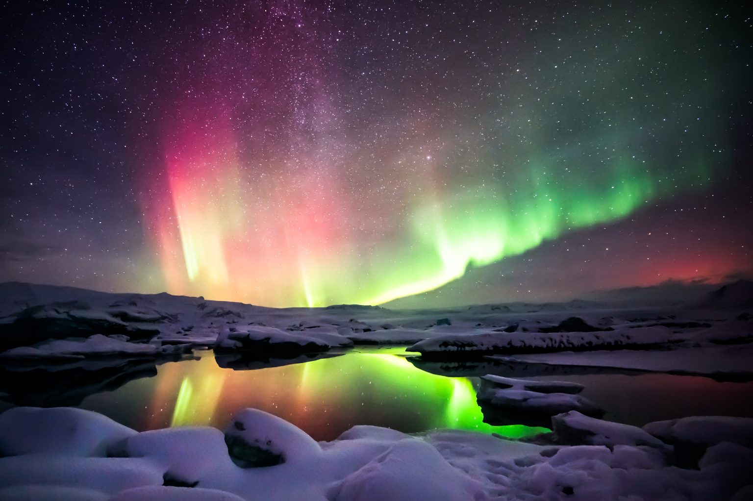 Aurora borealis over Icelandic landscape